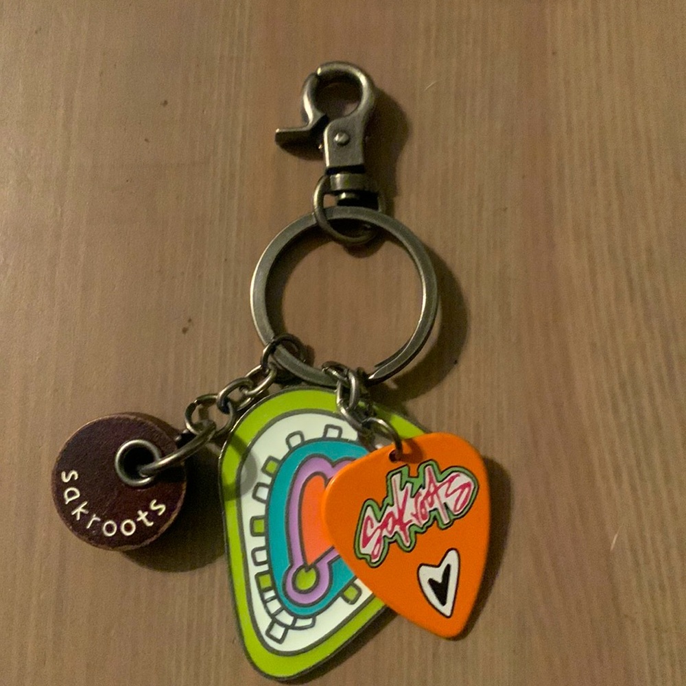 Sak roots purse/ key chain, with guitar picks🎸